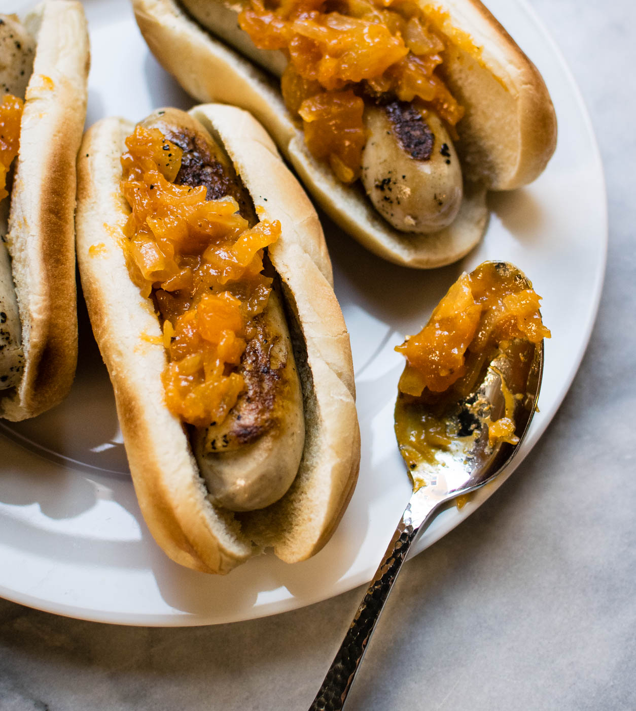 Spice up game day: Chicken sliders, Caribbean-style hot dogs