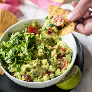 BLT Guacamole with tortilla chips.