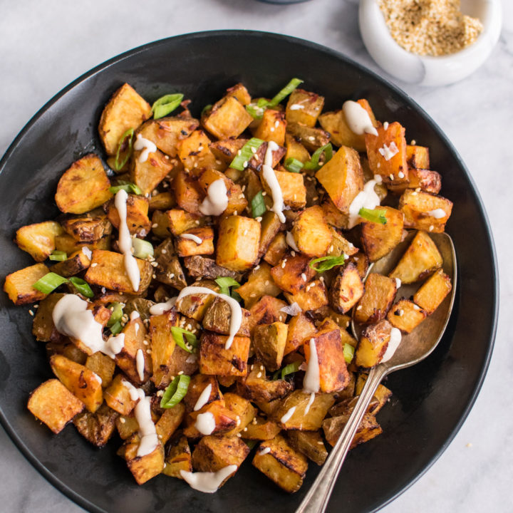 Harissa roasted potatoes with tahini sauce