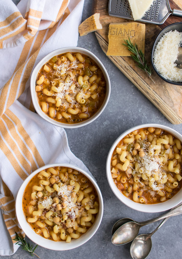 Pasta e Fagioli in bowls with parmesan cheese on top