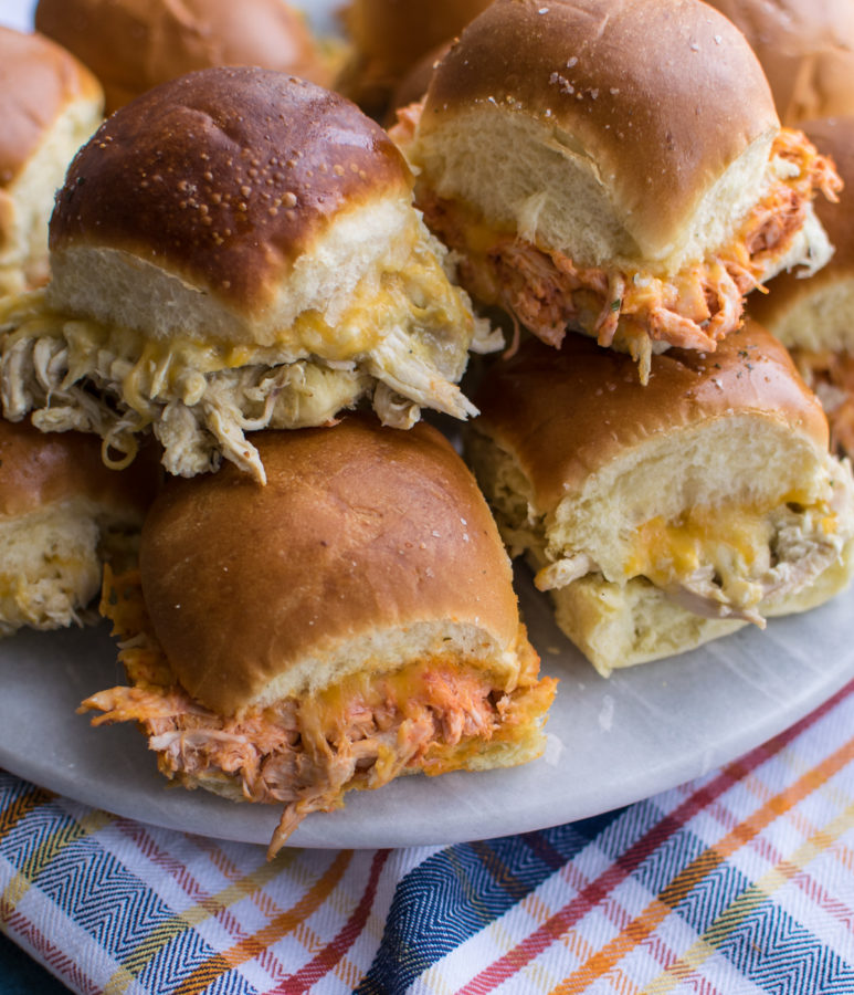 green and red Chicken Enchilada Sliders on a platter