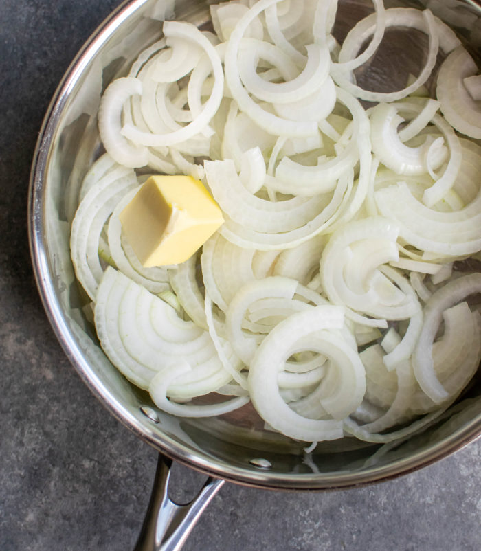 Onions and butter in a skillet