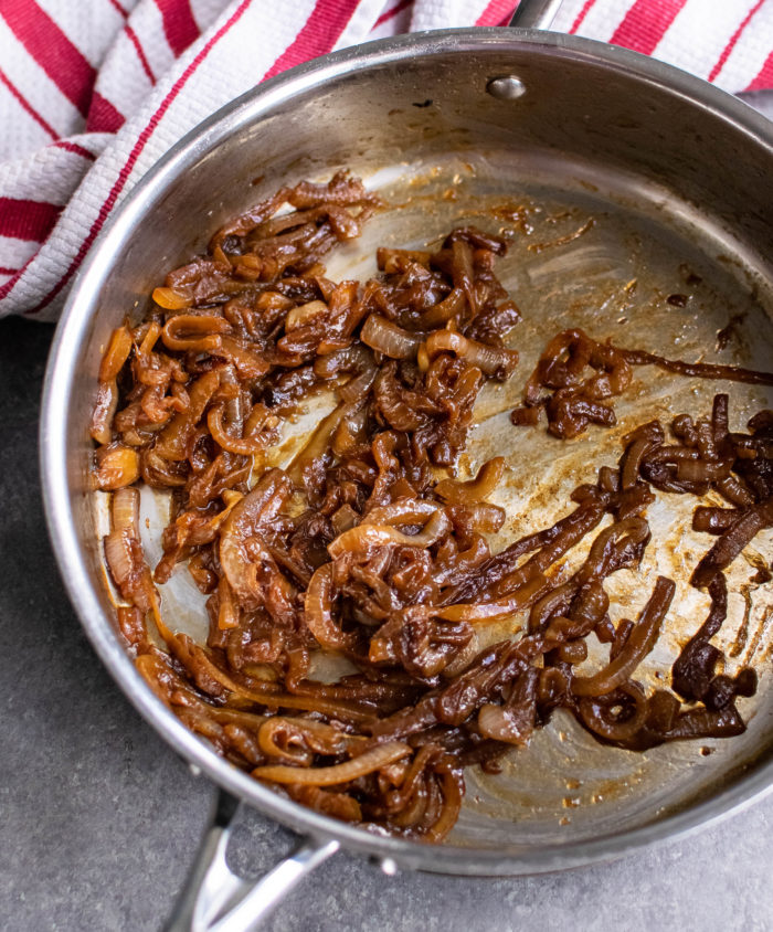 caramelized onions cooking in a skillet