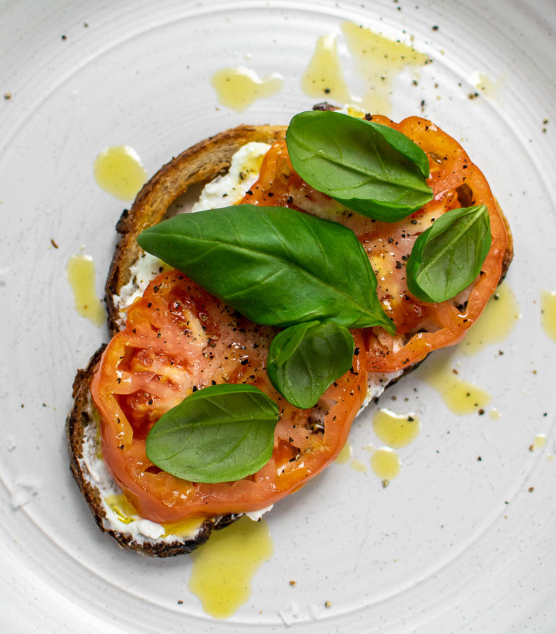 Ricotta Tomato Toast on a plate.