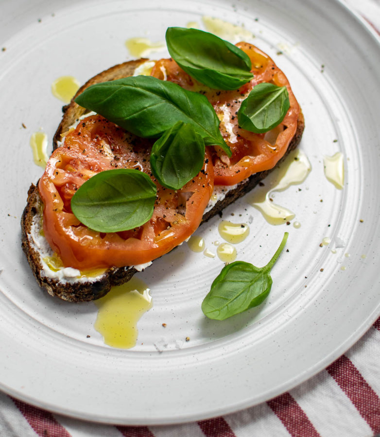 Ricotta Tomato Toast on a plate.