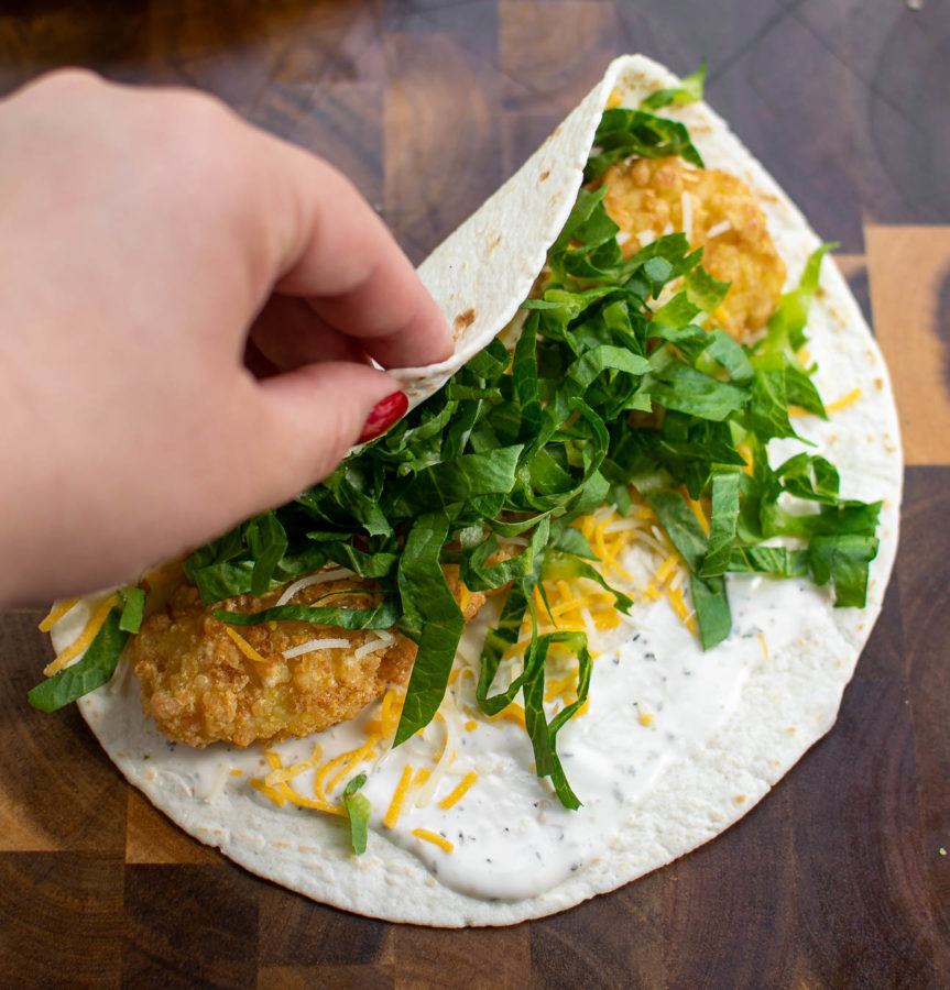 Wrapping the Crispy Ranch Snack Wrap.