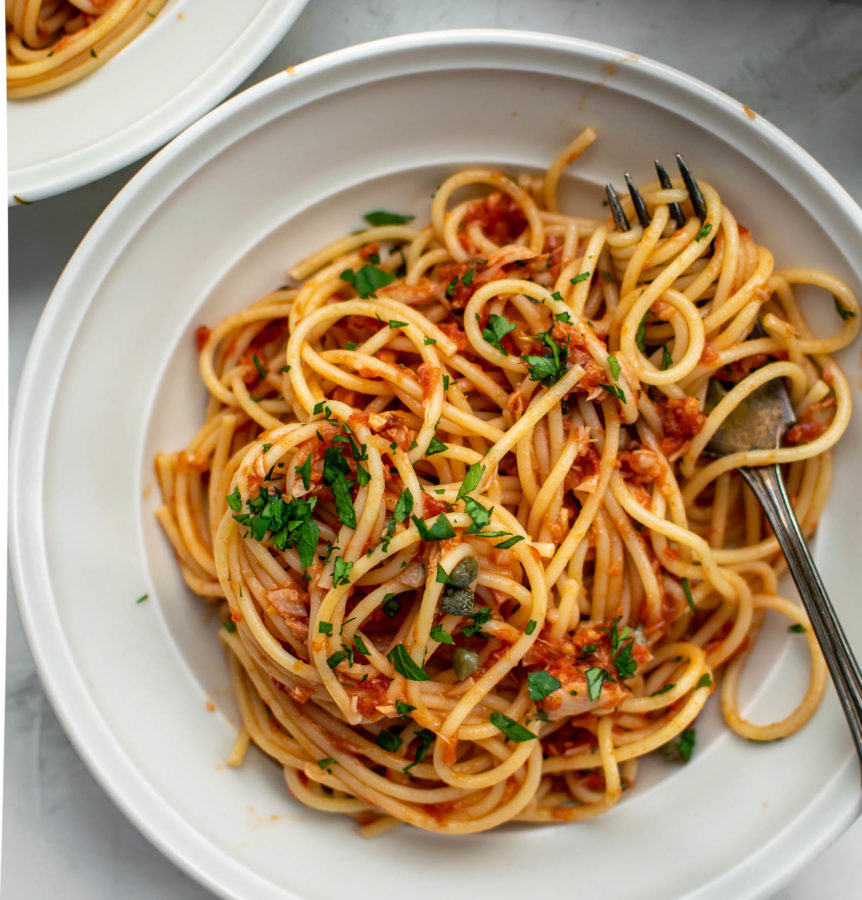 Spaghetti with Tuna and Tomatoes served in a bowl.