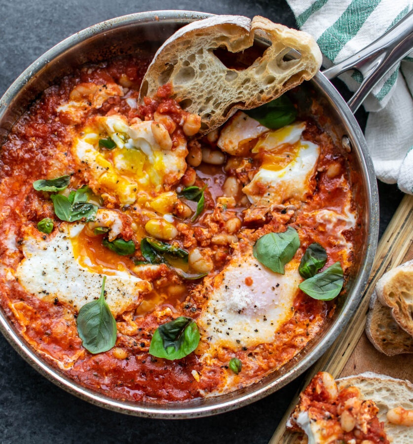Eggs in Purgatory with White Beans with toasted bread dipped into the eggs.