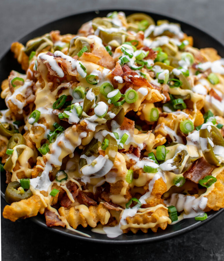 Loaded Bacon Cheese Fries in a serving bowl.