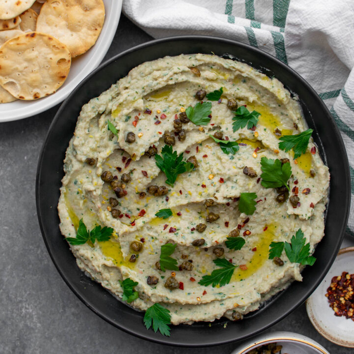 Roasted Garlic and Artichoke White Bean Dip with Fried Capers.