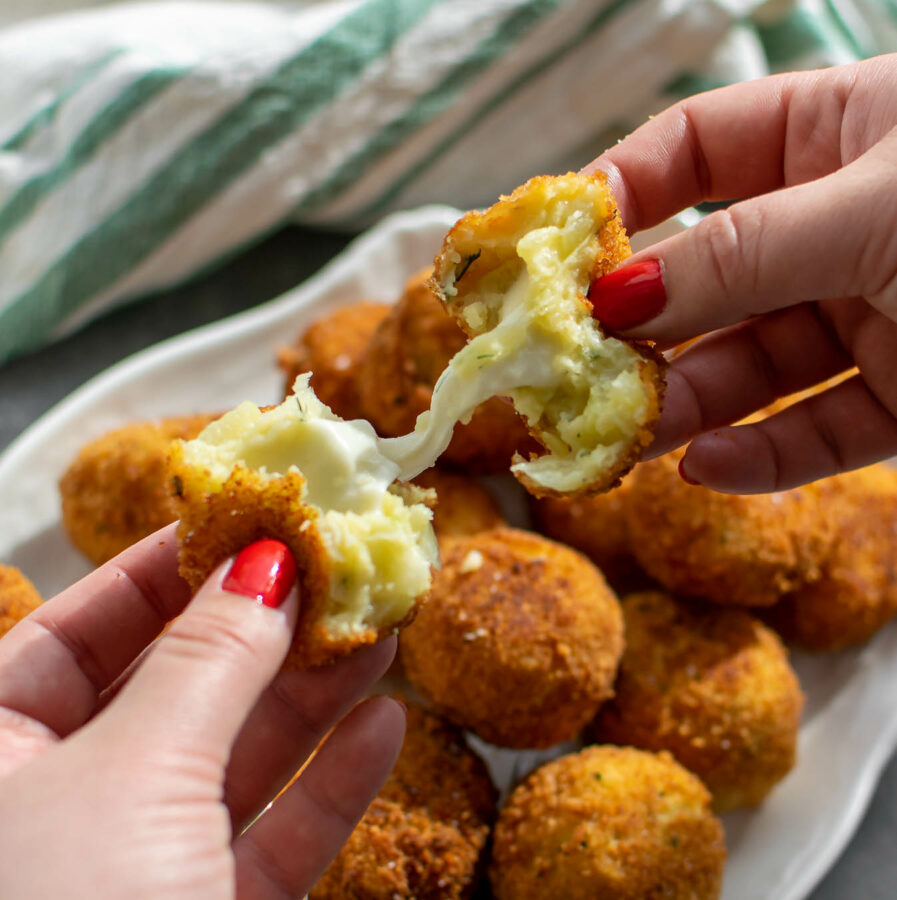 Cheesy Fried Colcannon Balls cheese pull.