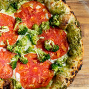 Pesto Pizza with Tomatoes and broccoli.